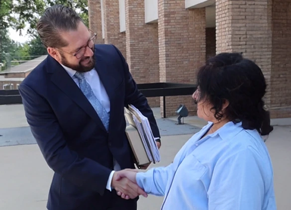 Matt shaking client's hand